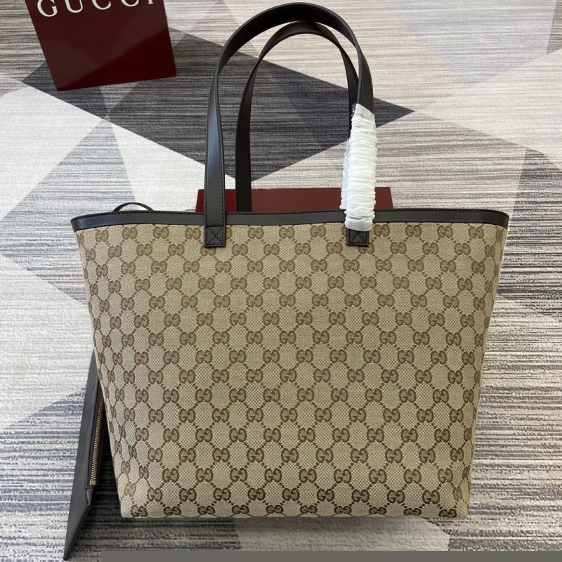 G*u*i shopping bags
